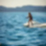 Electric foil board gliding over water
