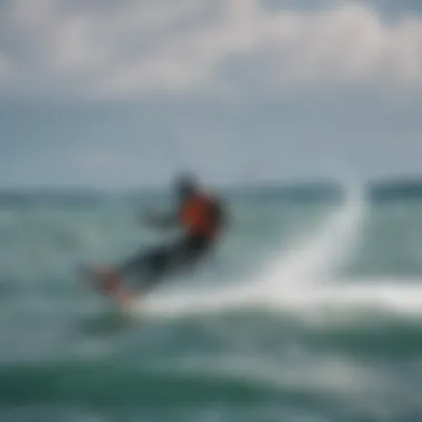 Optimizing Kite Clearance Techniques A seasoned kiteboarder demonstrating proper stance and kite position to optimize clearance on the water.