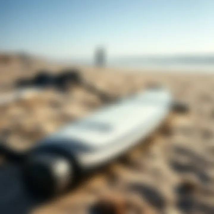 Close-up of wingfoil equipment laid out on the beach